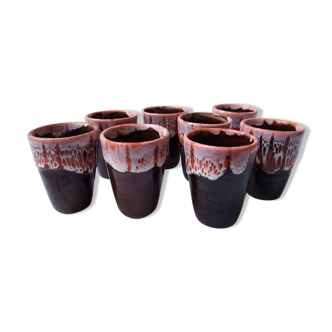 Set of 8 shots in varnished sandstone