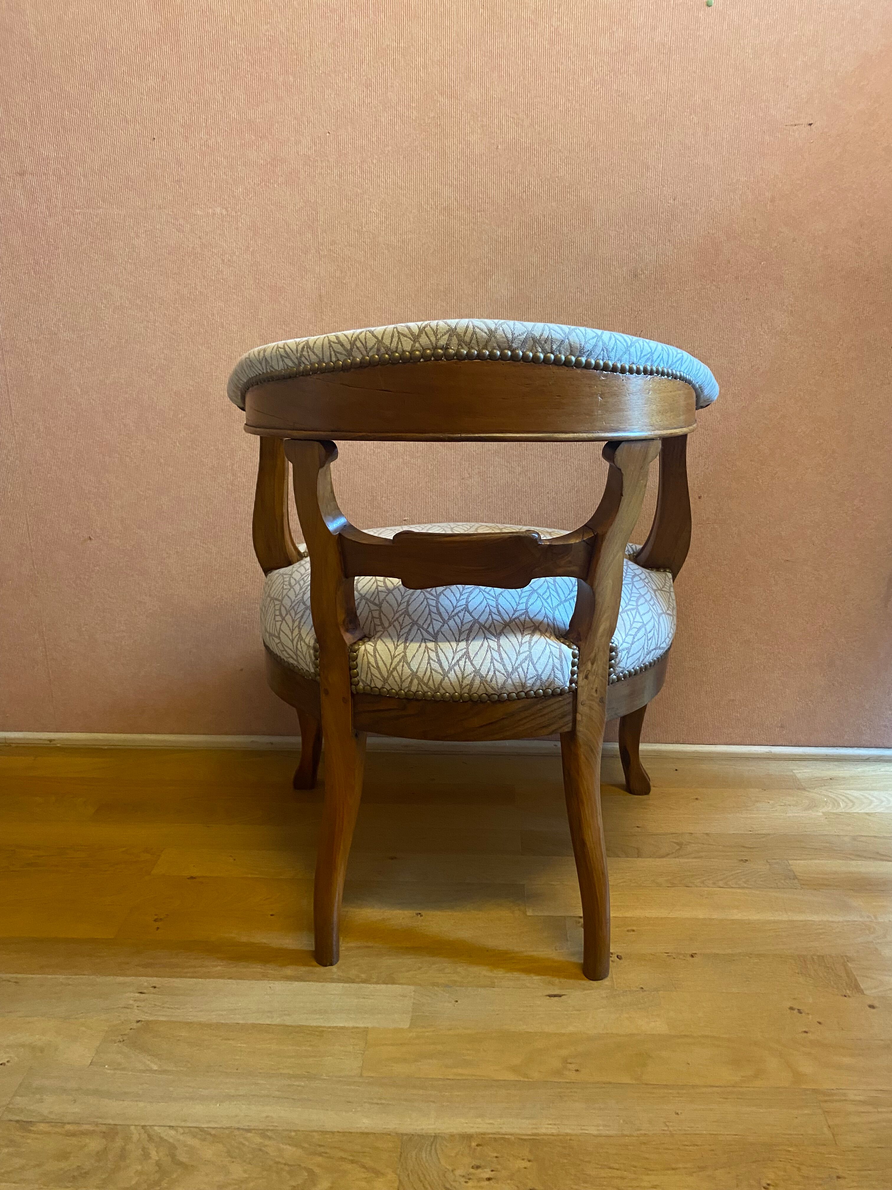 office armchair in walnut, nineteenth century, fully trimmed and reupholstered.