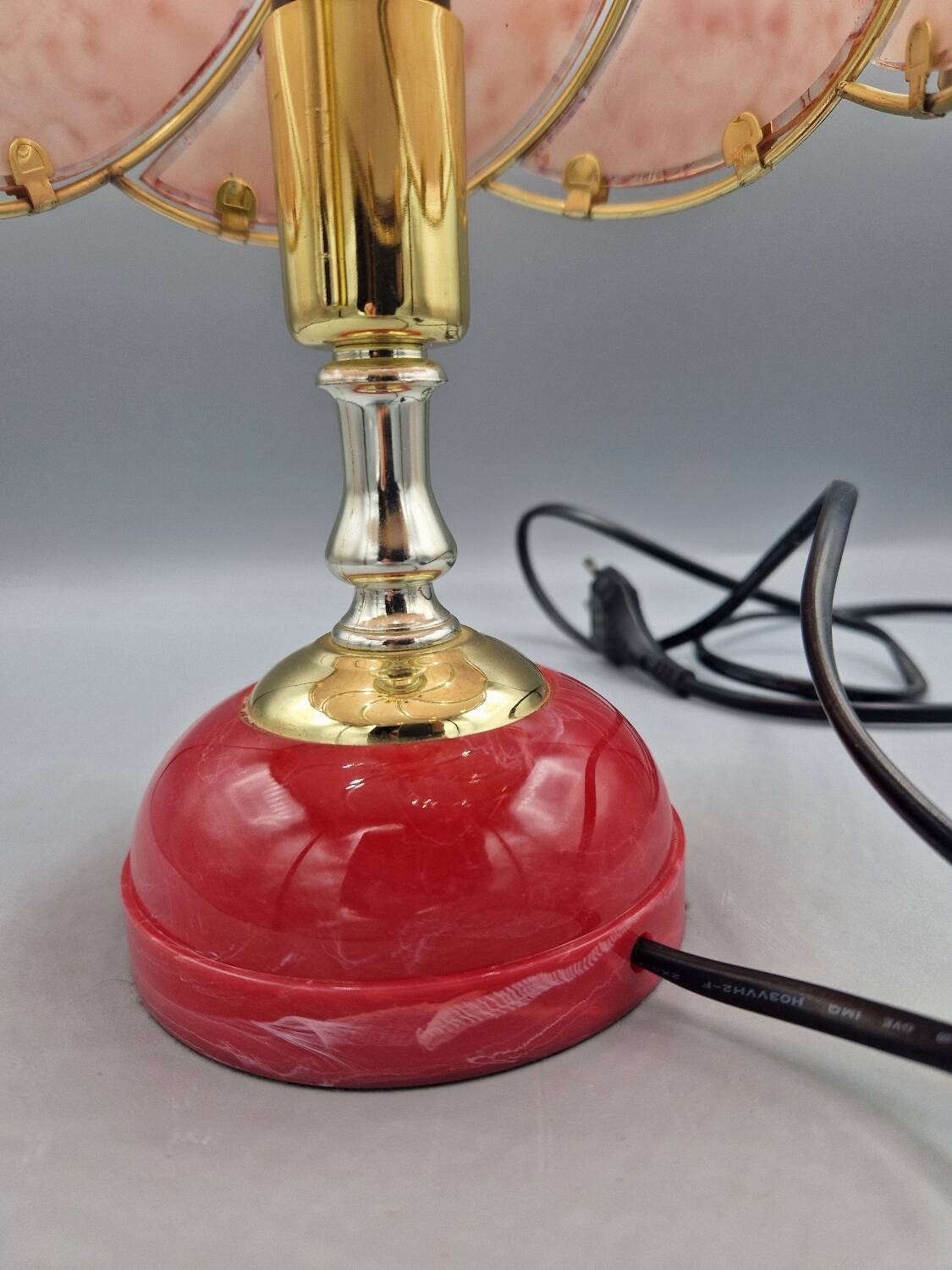 Vintage pink glass globe lamp with brass details and pink base