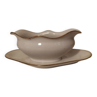 Small old white and golden ravine gravy boat