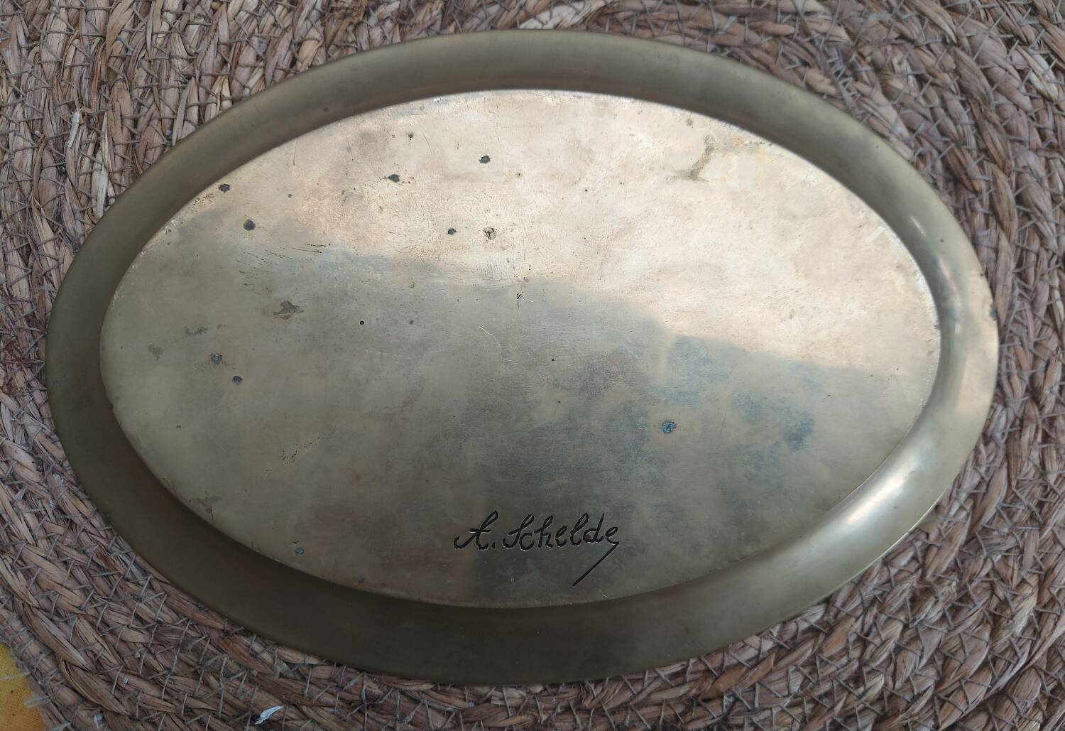 Oval enamelled plate signed A Schelde