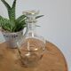 Small glass bottle with gold edges