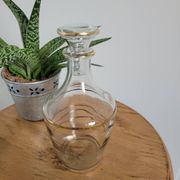 Small glass bottle with gold edges