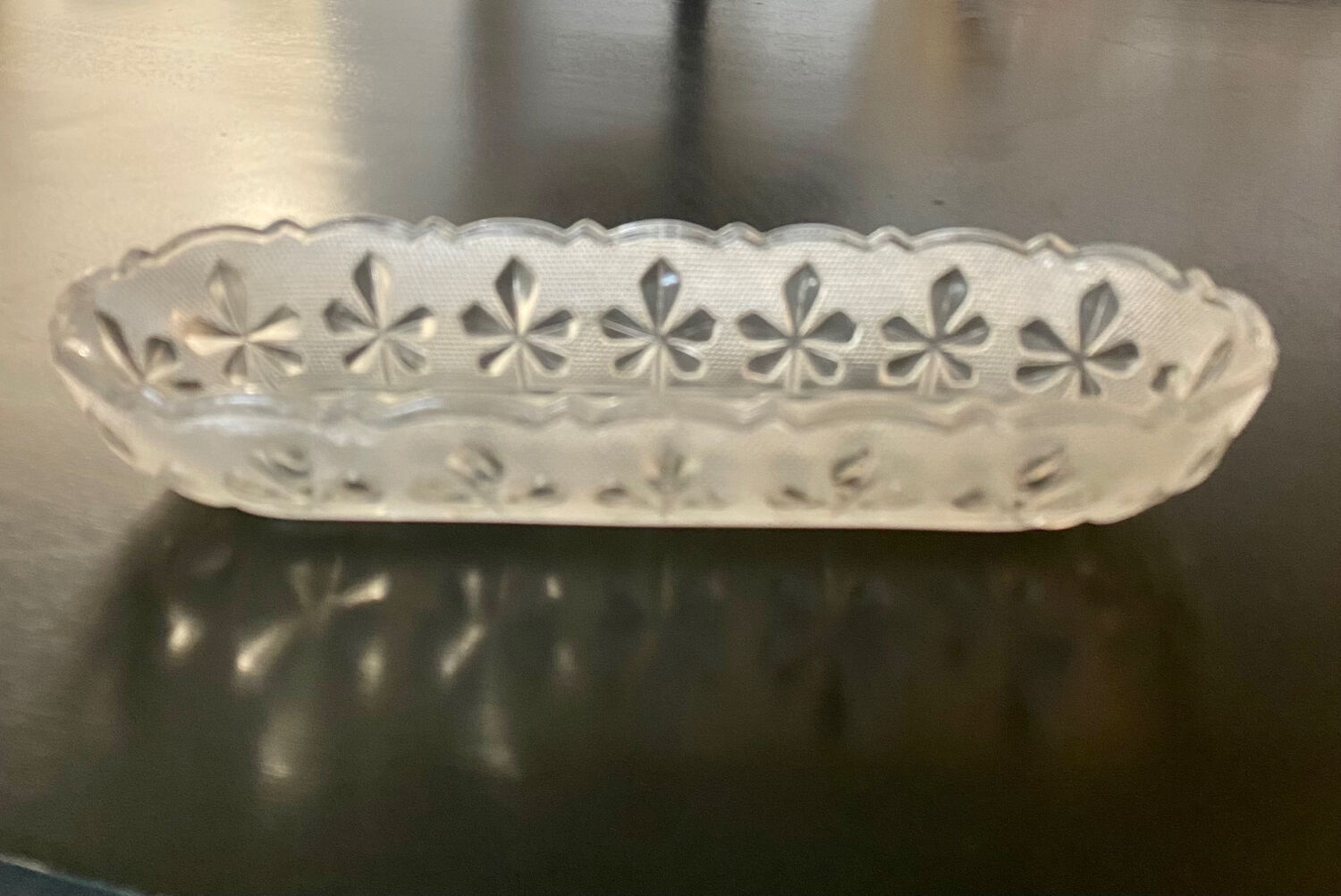 1 Elongated molded glass cup