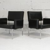 Pair of stainless steel, black leather-like armchairs, France, circa 1970