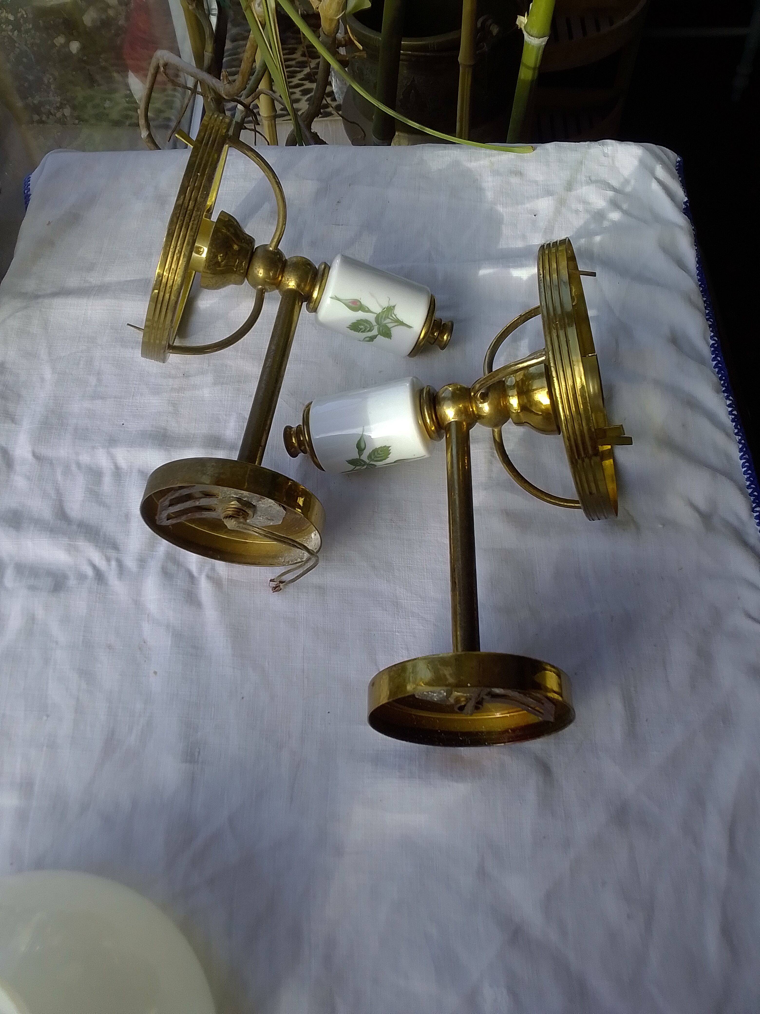Pair of porcelain brass sconces