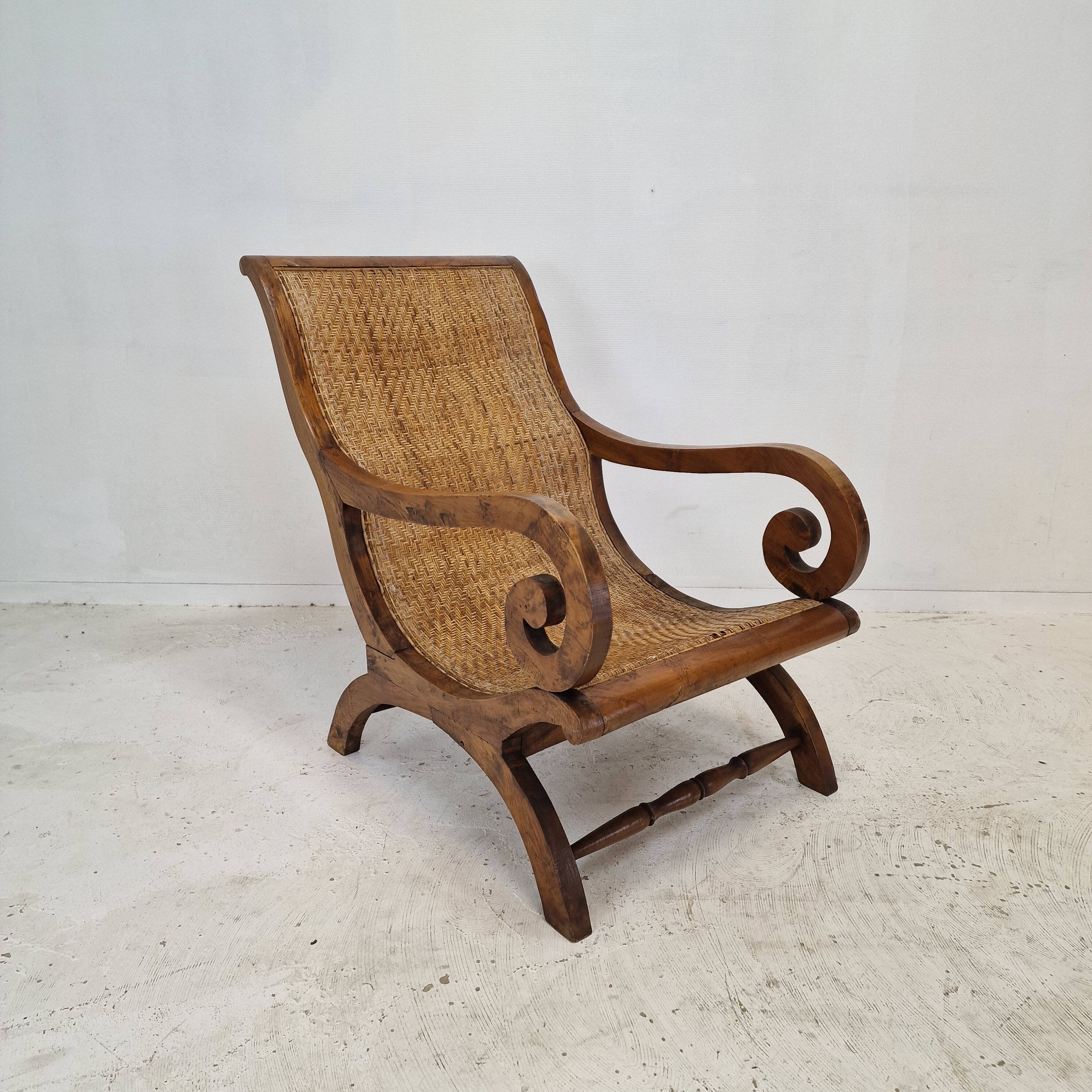Colonial Style Carved Caned Plantation Chair