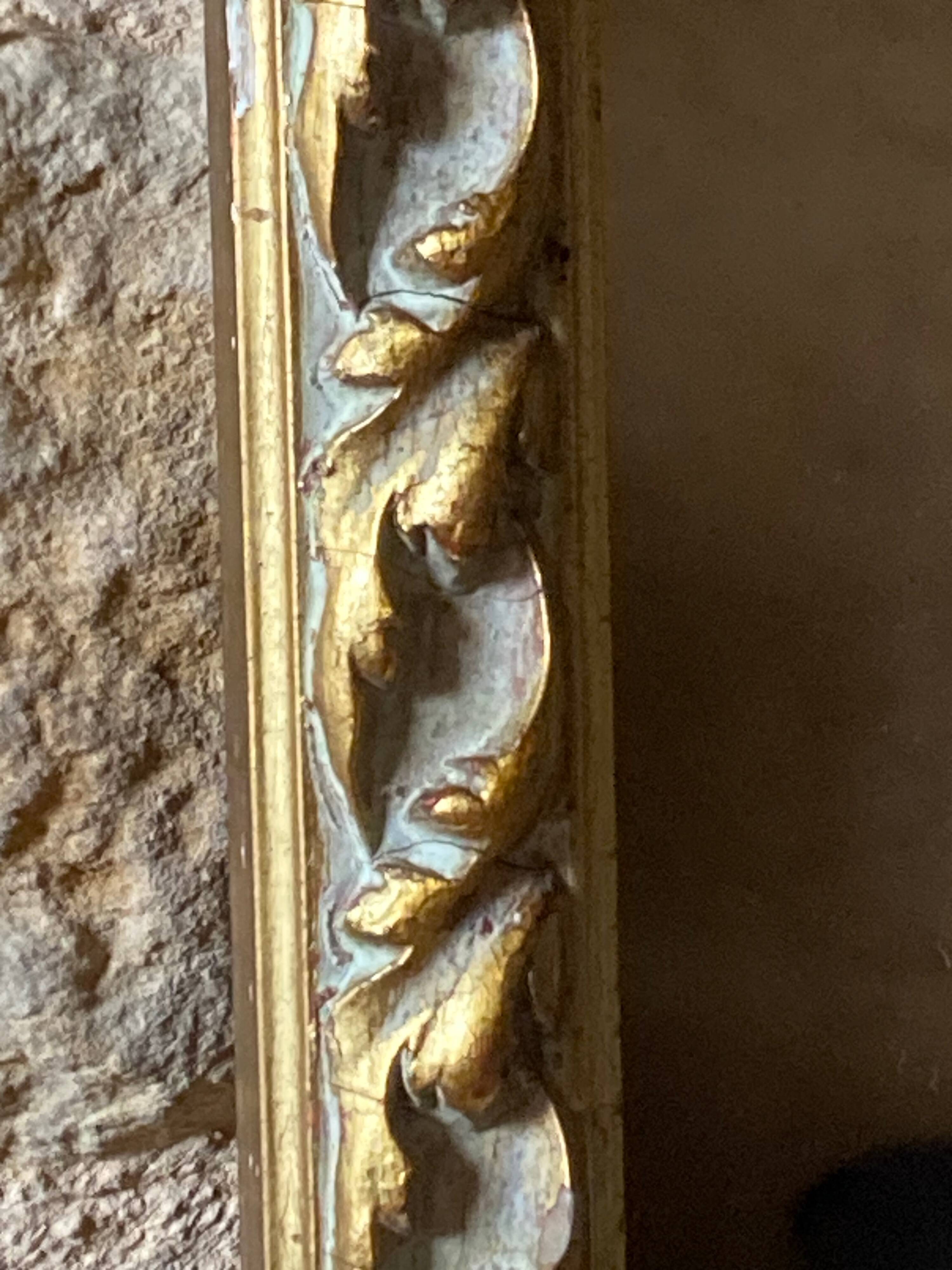 Grand miroir ancien, cadre en bois sculpté blanc et or