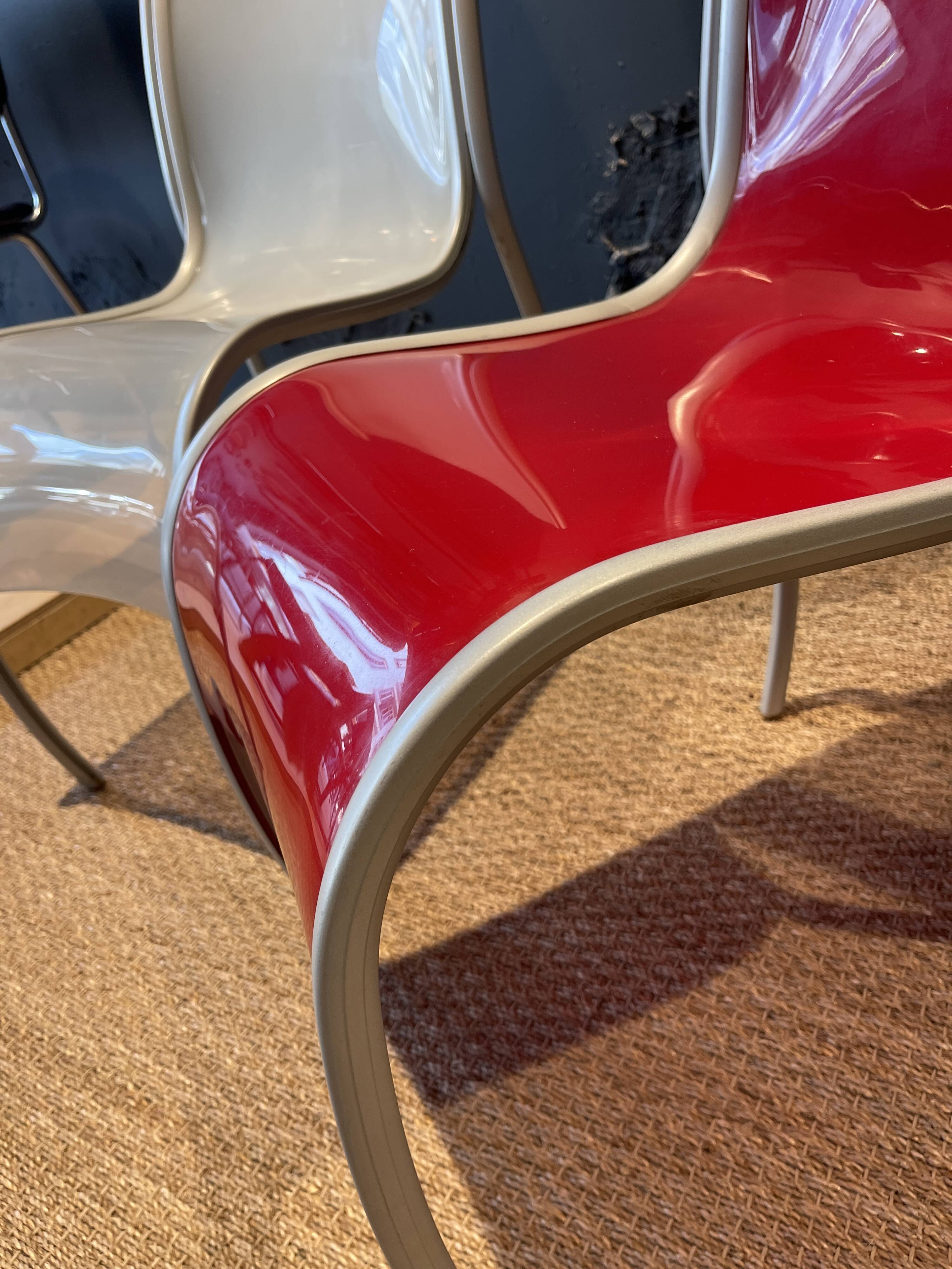 Pair of FPE chairs by Ron Arad for Kartell translucent and red Italy
