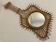 Ancien miroir guitare en rotin