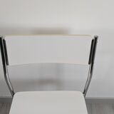 Modernist chair in chrome metal and white laminate, 1960s style.