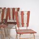 4 chaises de jardin rouges, c.1920