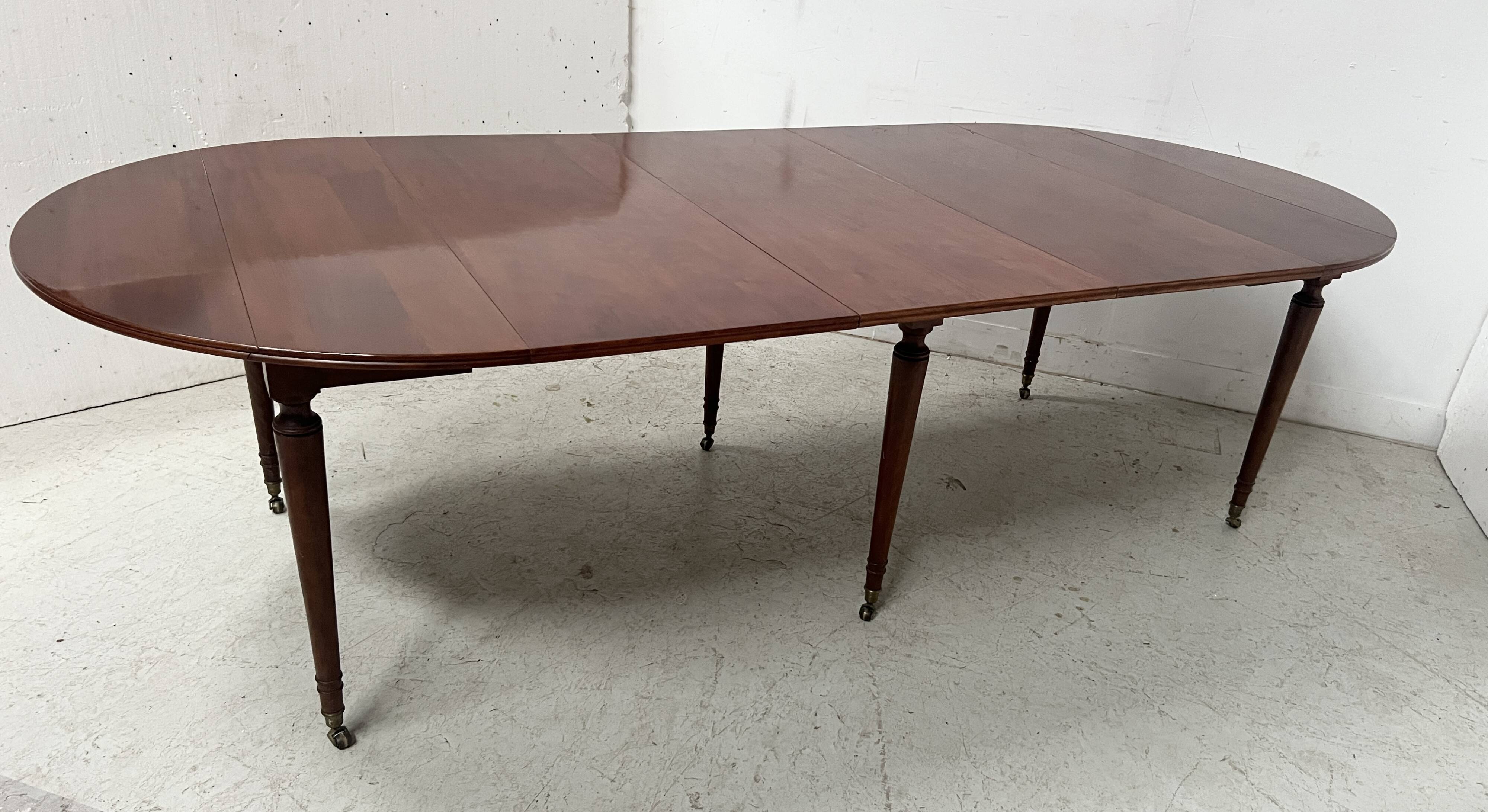 A six-foot Louis XVI style mahogany table from the 19th century.