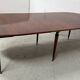 A six-foot Louis XVI style mahogany table from the 19th century.