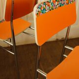 Pair of orange Formica "Tublac" chairs