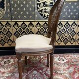 Suite of 6 Louis XVI style chairs in cane and fabric