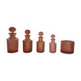 Set of 4 bottles and an art deco box in pink Bayel crystal
