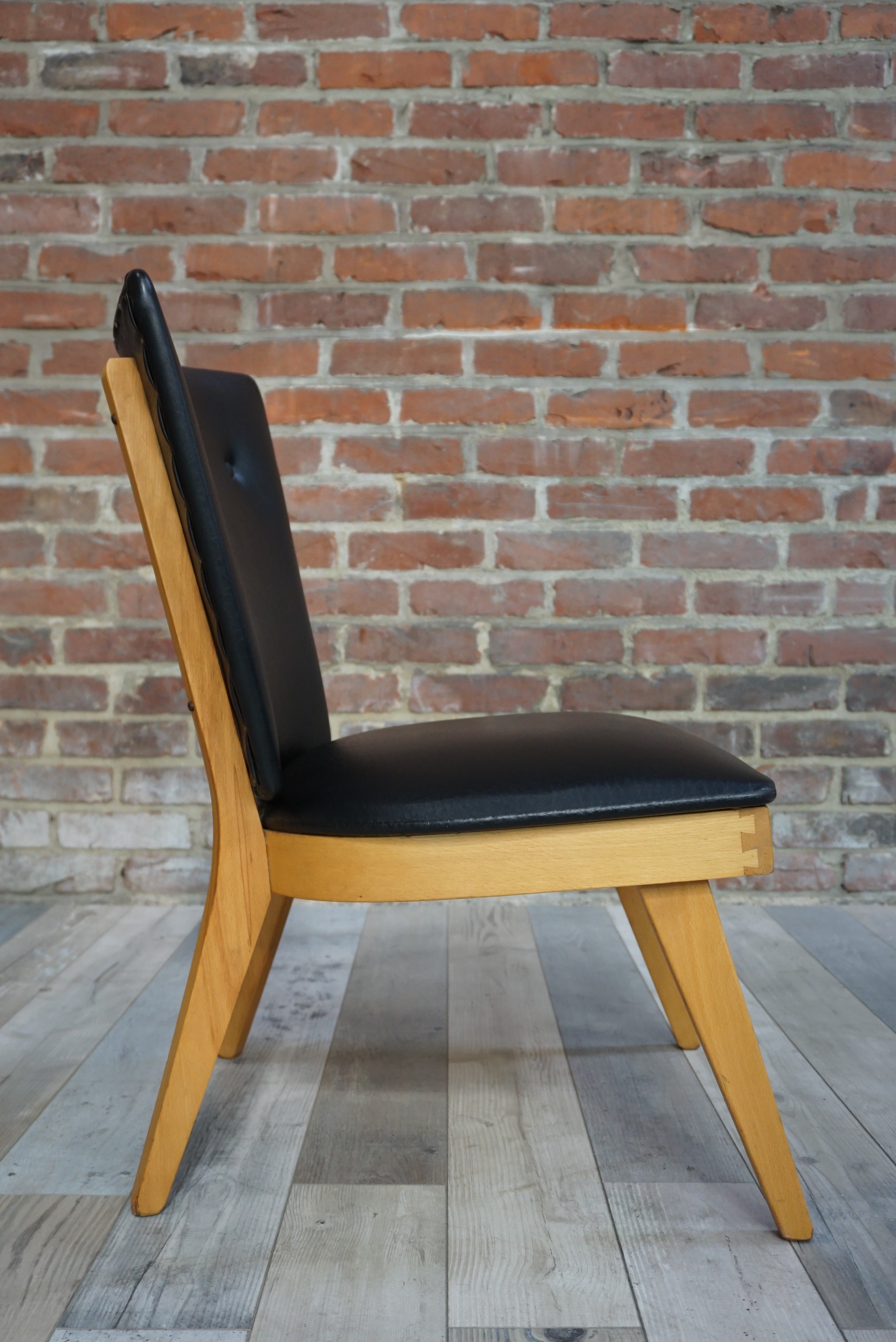 Chair 50 years in wood and faux black leather cocktail