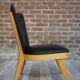 Chair 50 years in wood and faux black leather cocktail