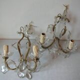 Old pair of double lamp lights with glass and brass pendants, retro decoration