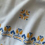 Embroidered white tablecloth