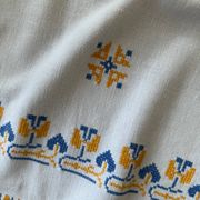 Embroidered white tablecloth