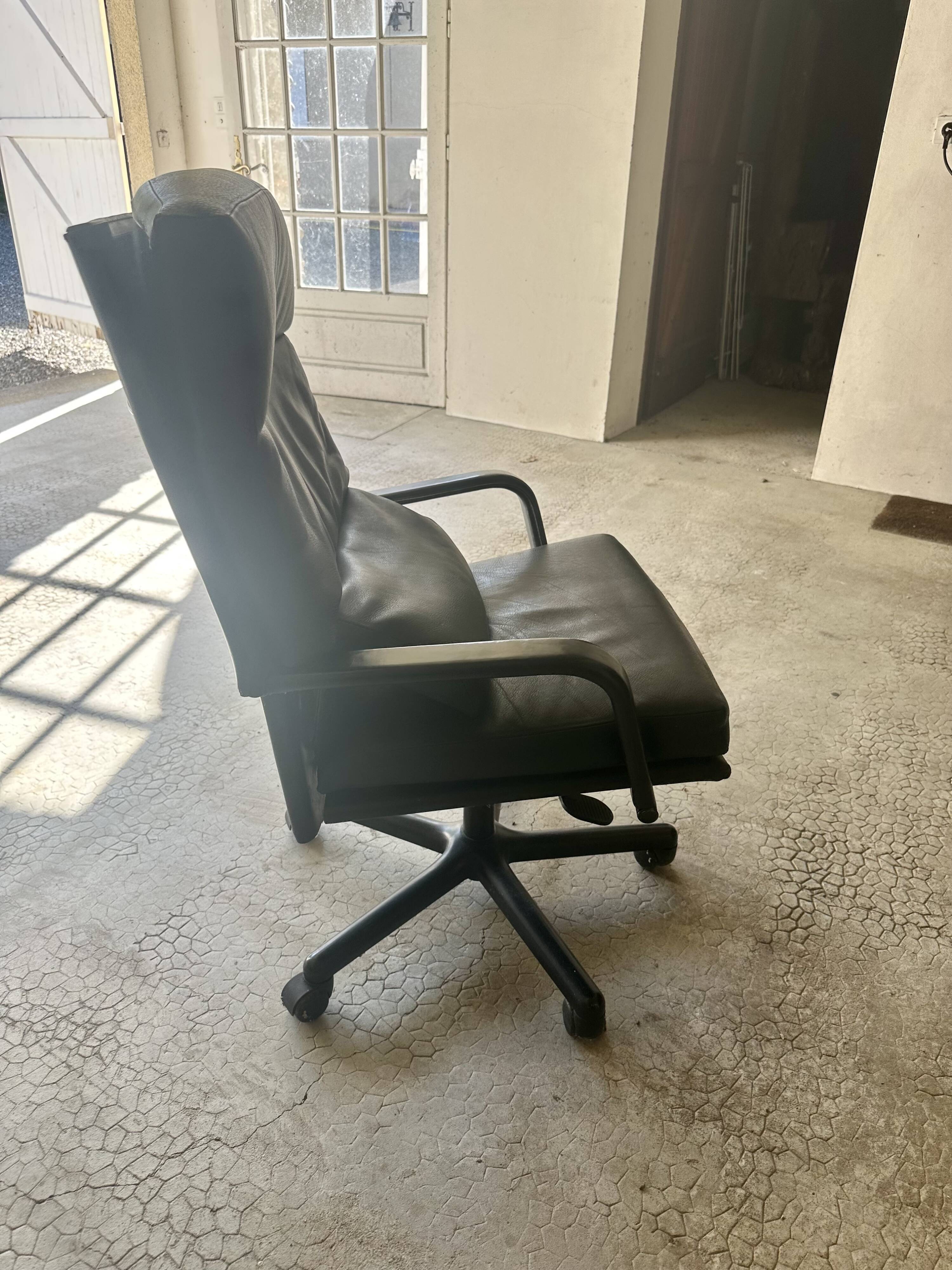 Executive desk by Guido Faleschini and armchair by Matteo Grassi