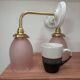 Pair of pink tulip wall sconces