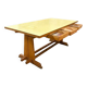 Vintage wooden table with a yellow formica top.