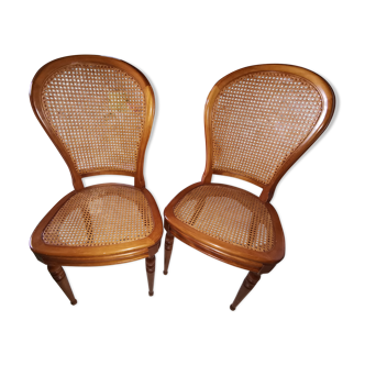 Set de 2 chaises en merisier cannées