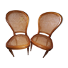 Set de 2 chaises en merisier cannées