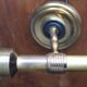 Pair of vintage Lunel house wood and brass wall lights