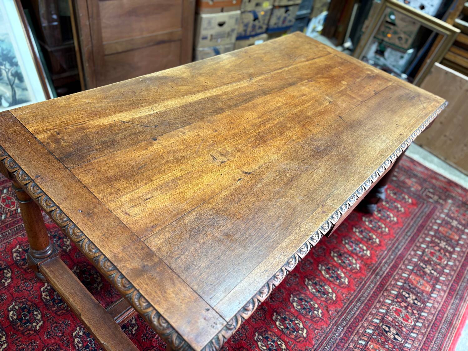 Large antique carved wooden desk in Renaissance style