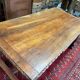 Large antique carved wooden desk in Renaissance style