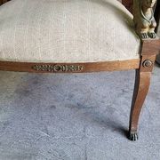 Pair of walnut armchairs in Empire style, Egyptian revival.