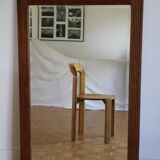 Beveled mirror grooved wood