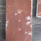 Lot of 4 rectangular glazed terracotta plates.