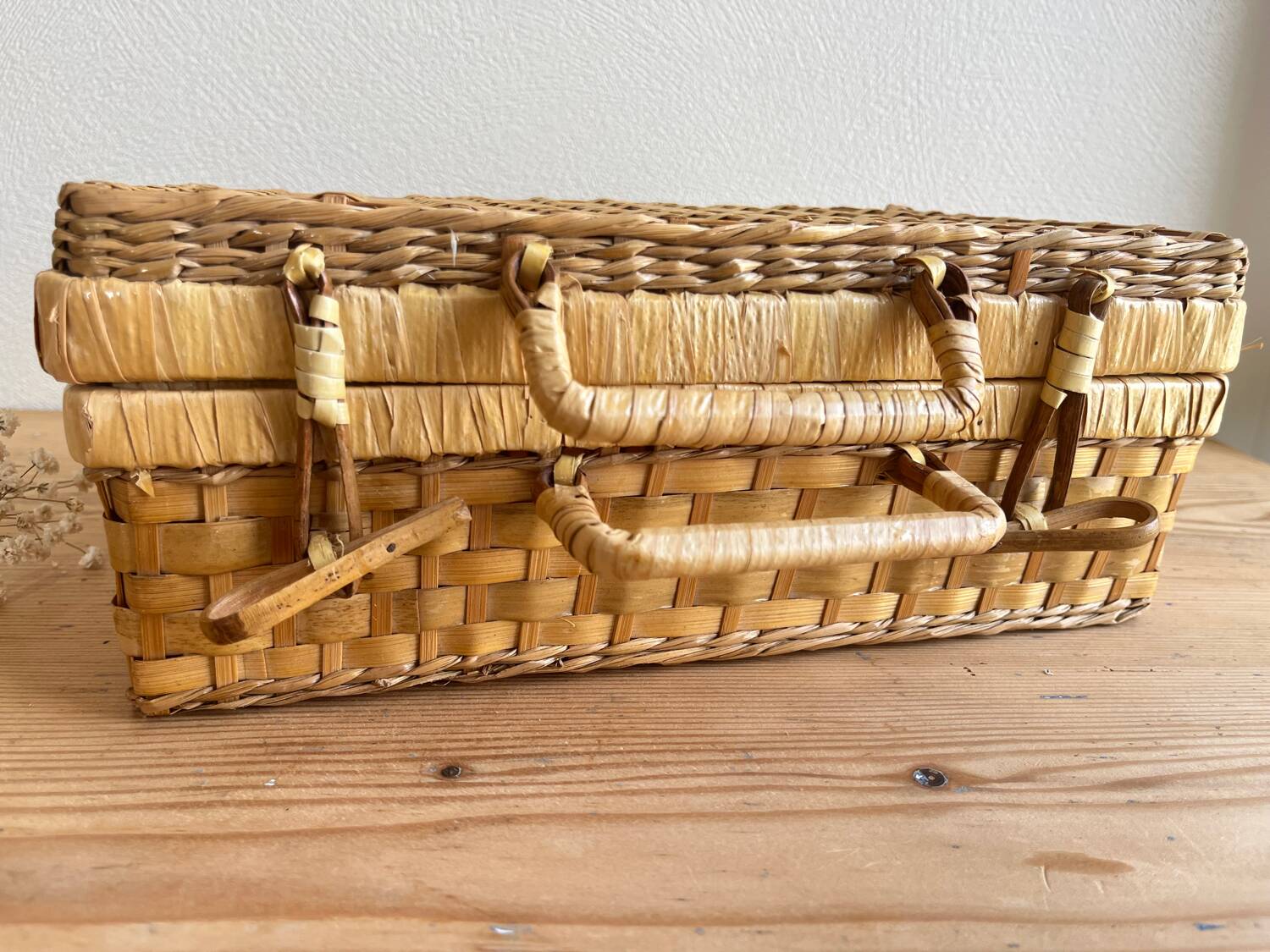 Vintage woven wicker suitcase