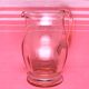 Rounded pink glass decanter