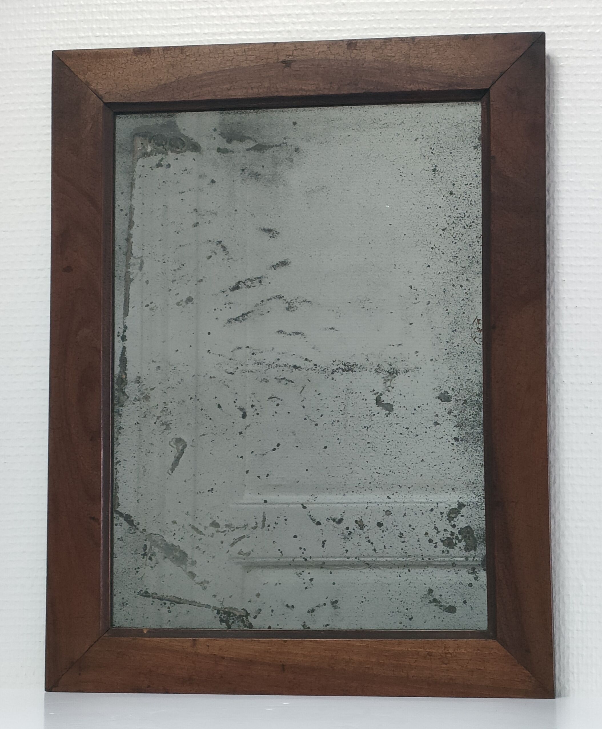 Solid wood mirror and patinated ice early twentieth century
