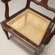 Antique walnut armchair with caned seat, Italy, 18th century