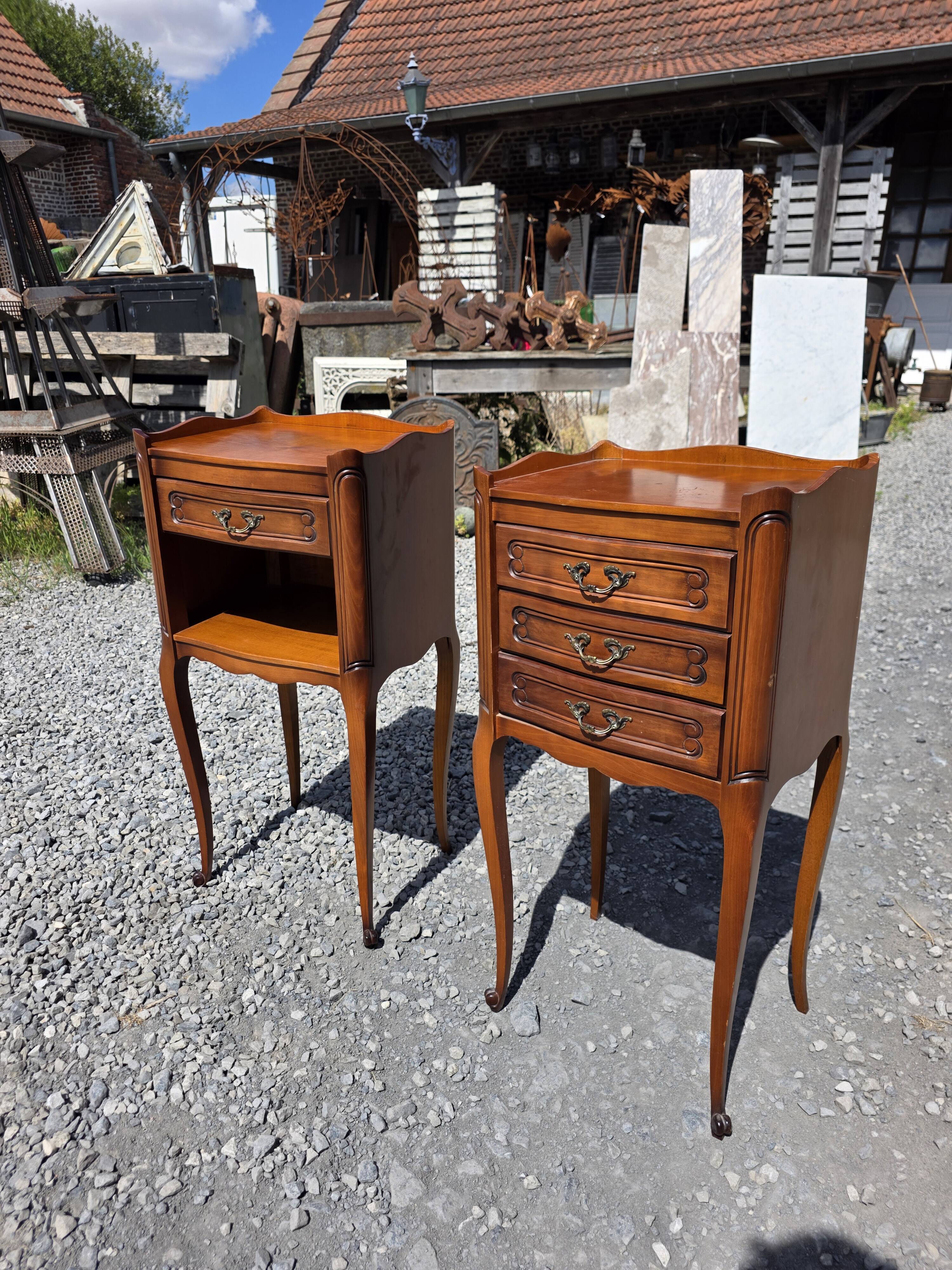 Pair of Louis XV style bedside tables in cherry wood.