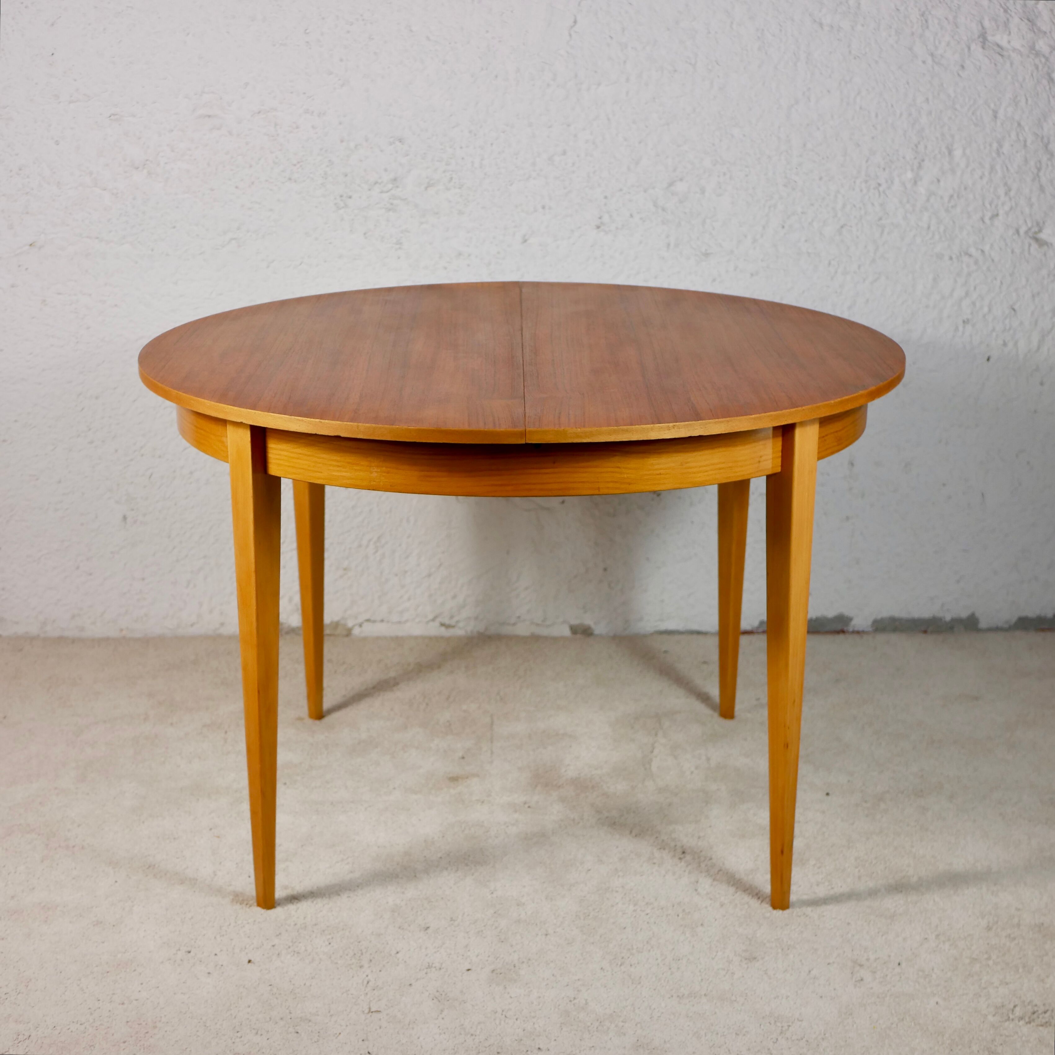 Scandinavian style teak table with butterfly extension