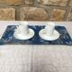 Duo of cups and under cups with white porcelain coffee S-P