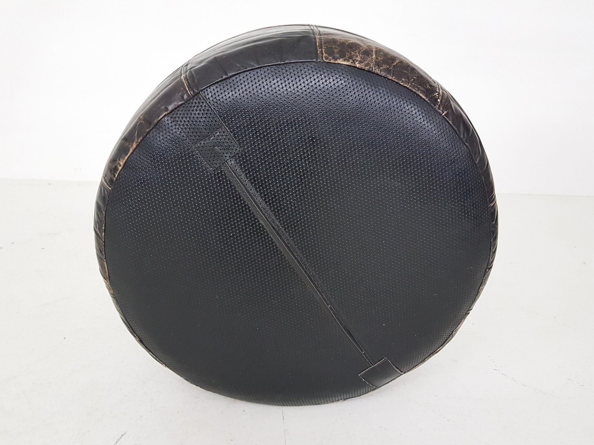 Mid-century round leather ottoman