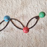 Vintage wall-mounted coat rack in wrought iron with coloured balls - Roger Feraud