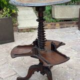 Old pedestal table with rotating trays