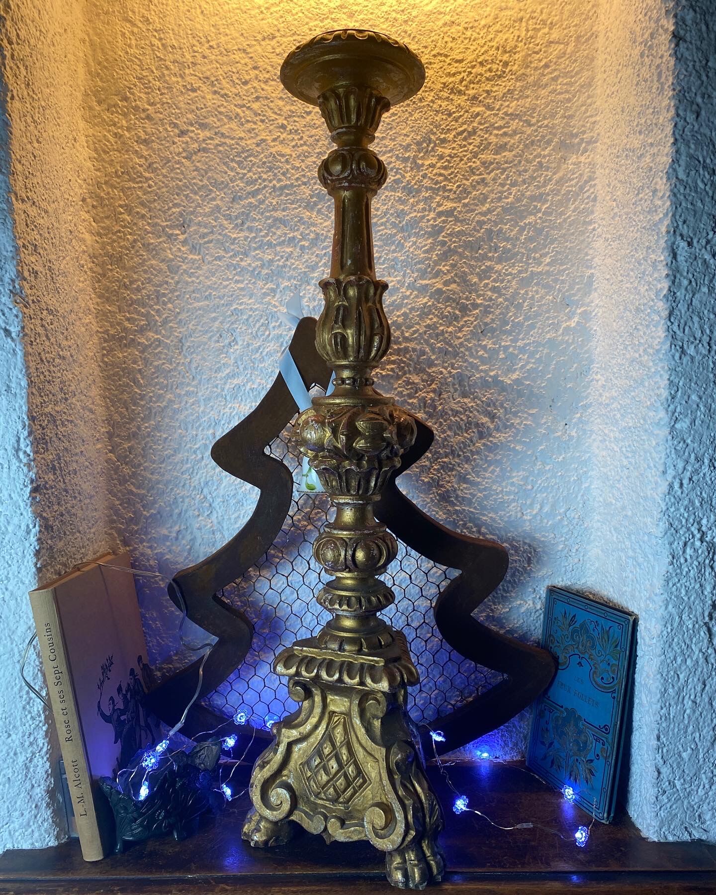 Picnic candle in old gilded wood