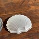 Vintage silver-plated shell butter dish with transparent bowl.