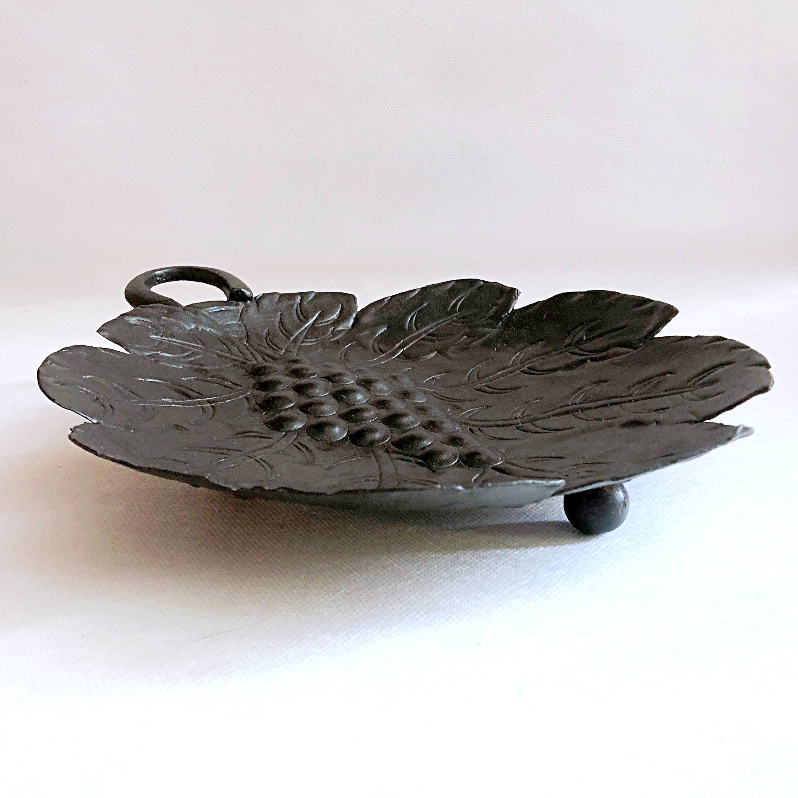 Artisanal embossed metal tripod dish